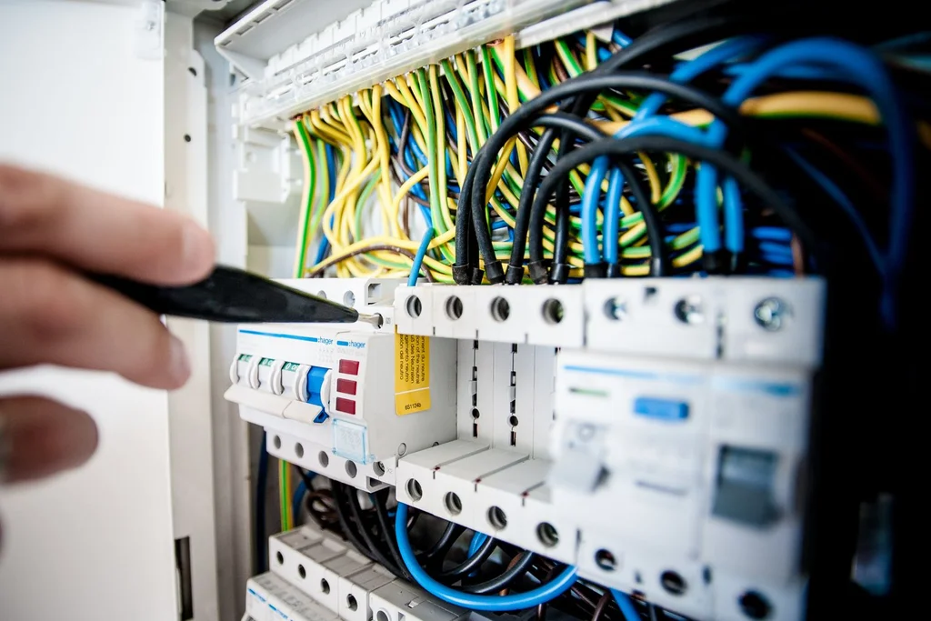 Licensed electrician working on an electrical panel in Brandon Florida